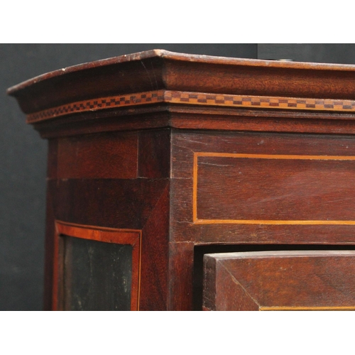 206 - An Edwardian satinwood crossbanded mahogany serpentine display cabinet, outswept cornice above a gla... 