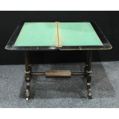 208 - A Victorian gilt metal mounted ebonised and marquetry rounded rectangular card table, twin end suppo... 