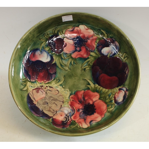 219 - A Moorcroft Anemone pattern bowl, approx 27cm diameter