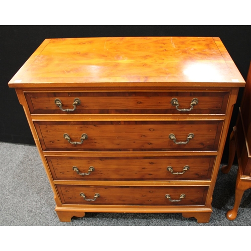 235 - A yew chest of four long drawers, 92cm high, 86cm wide; a similar side cabinet and bureau (3)