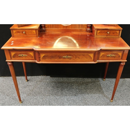 251 - An Empire style dressing table, substantial triptych mirror arrangement above a slightly break-centr... 