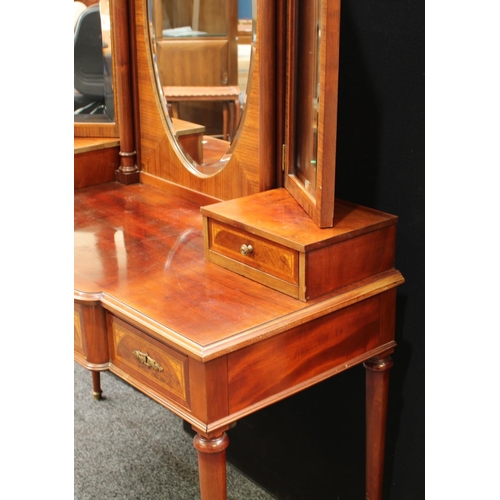 251 - An Empire style dressing table, substantial triptych mirror arrangement above a slightly break-centr... 