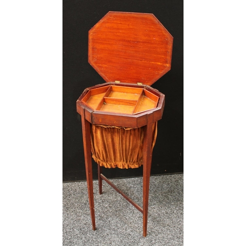 256 - A George III mahogany work table, of small propotions, hinged top inlaid with a circular batwing pat... 