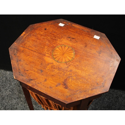 256 - A George III mahogany work table, of small propotions, hinged top inlaid with a circular batwing pat... 