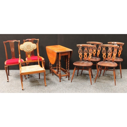 274 - A set of four Ercol dining chairs; an oak barley twist gateleg table; a pair of early 20th century m... 