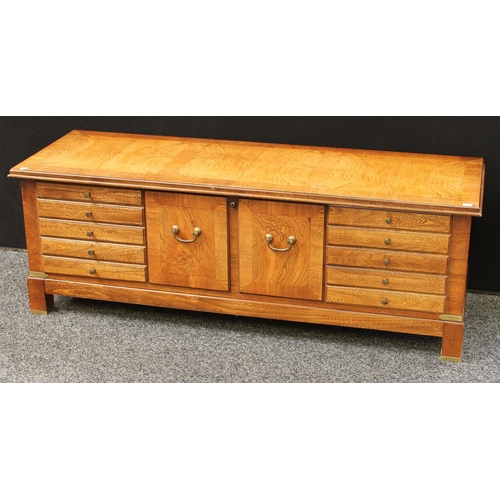 276 - A mid-late 20th century American blanket chest, hinged rectangular top above front blindly applied w... 