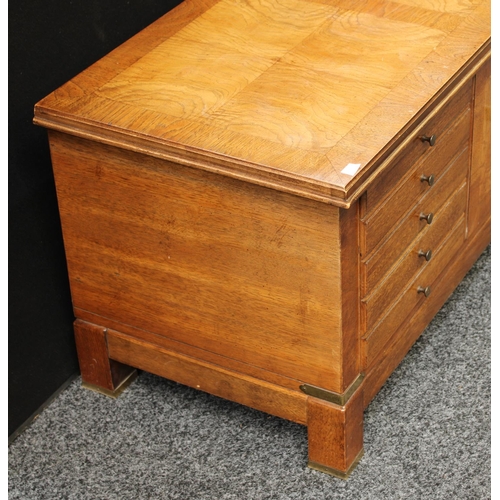 276 - A mid-late 20th century American blanket chest, hinged rectangular top above front blindly applied w... 