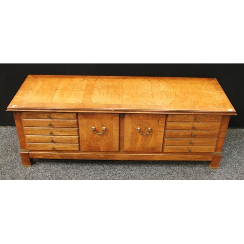 276 - A mid-late 20th century American blanket chest, hinged rectangular top above front blindly applied w... 