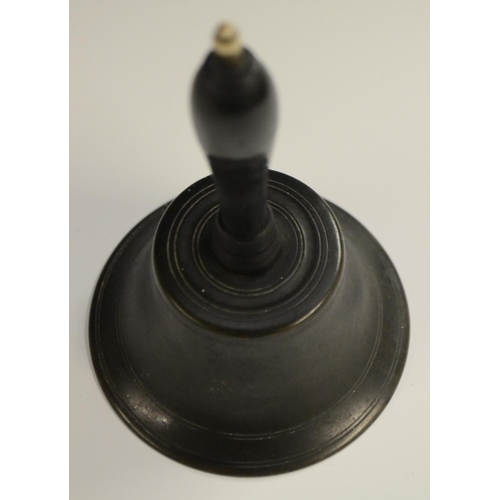 3011 - A 19th century desk or table bell, turned ebonised handle with bone finial, 14cm long