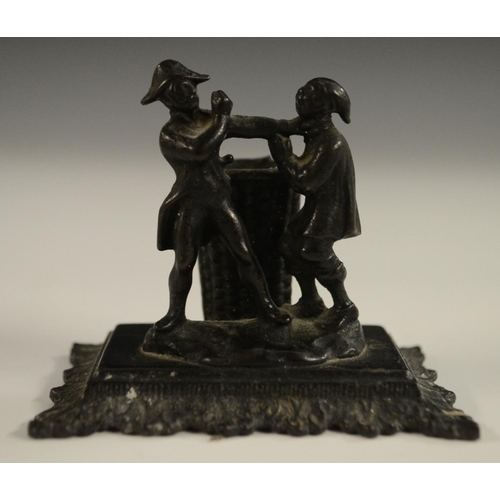 3014 - A 19th century French novelty table vesta, cast as a gentleman engaged in pugilism with a thief, the... 