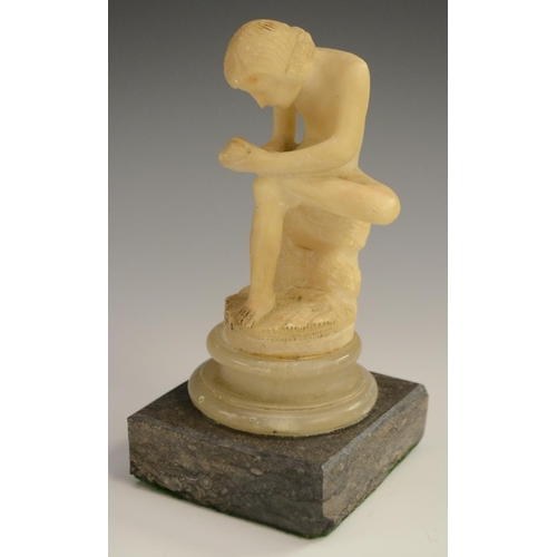 3019 - A 19th century Grand Tour alabaster carving, of Spinario, after the Antique, 13cm high