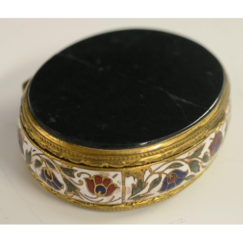 3024 - A 19th century agate mounted gilt metal and enamel oval snuff box, hinged cover, the side decorated ... 