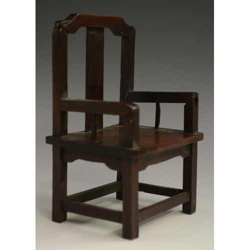 3069 - A Chinese hardwood miniature model, of an armchair, probably from a domestic altar, 14cm high, c. 19... 