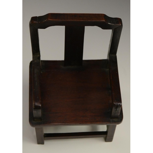 3069 - A Chinese hardwood miniature model, of an armchair, probably from a domestic altar, 14cm high, c. 19... 