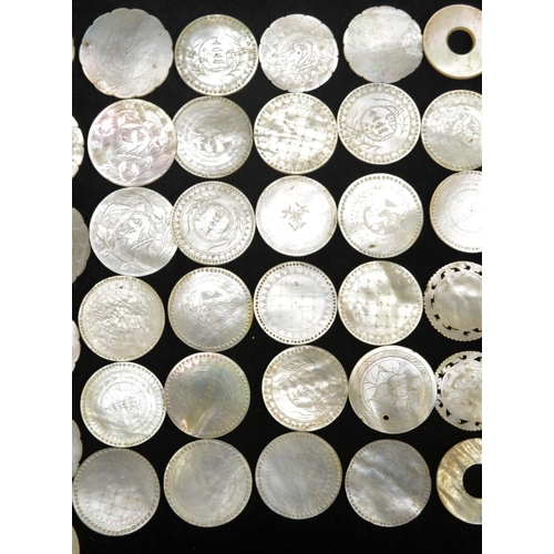 3077 - A collection of Chinese mother-of-pearl circular gaming counters, variously engraved, Canton, 19th c... 