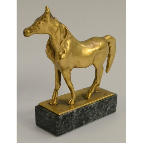 3094 - A gilt metal equestrian desk weight, cast as a standing horse, marble base, 9.5cm long