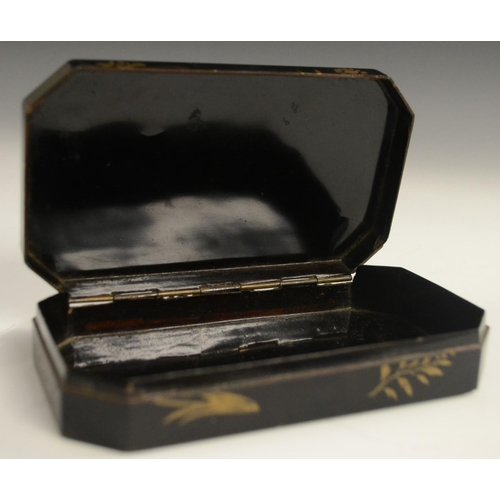 3103 - A Japanese export lacquer canted rectangular box, hinged cover decorated with a monumental lanscape,... 