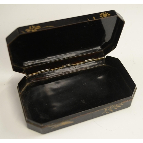 3103 - A Japanese export lacquer canted rectangular box, hinged cover decorated with a monumental lanscape,... 