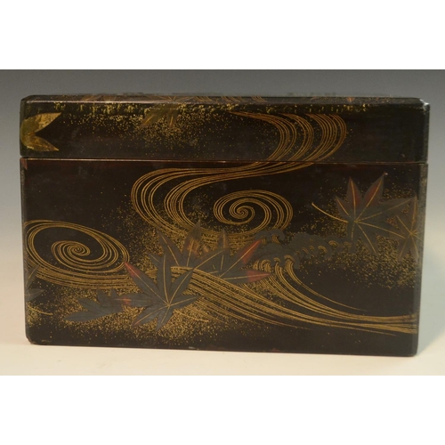 3105 - A Japanese silver mounted lacquer box and cover, decorated in red and gilt with swirls and autumnal ... 