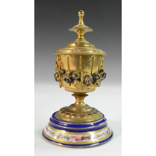 3115 - A Louis XVI Revival Neoclassical gilt-metal mounted porcelain inkwell, applied with swags of flowers... 