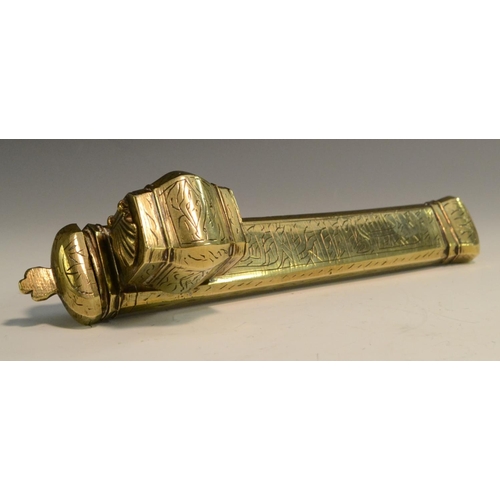 3119 - A Middle Eastern brass qalamdan pen case, chased in the Islamic taste with calligraphy, 24cm long, e... 