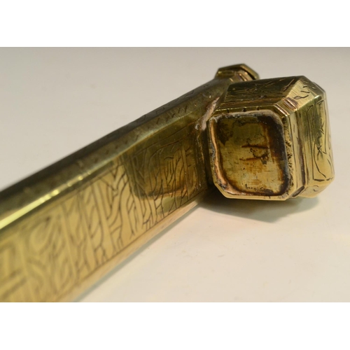 3119 - A Middle Eastern brass qalamdan pen case, chased in the Islamic taste with calligraphy, 24cm long, e... 