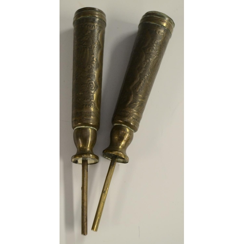 3126 - A pair of 19th century Chinese brass scroll or banner holders, chased with characters and ferocious ... 