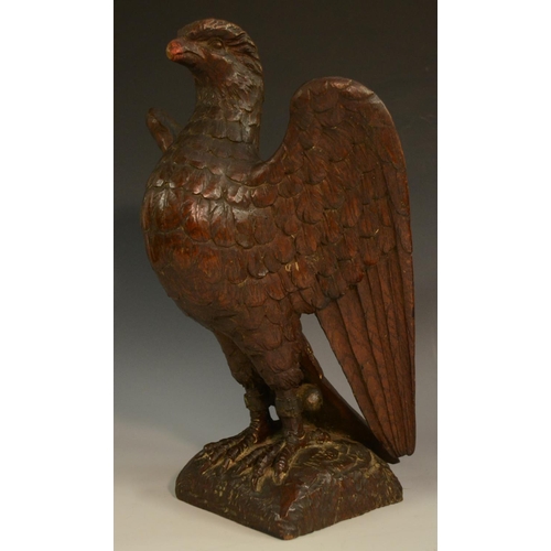 3127 - A pair of 19th century oak country house newel post crestings, each well carved as a falcon, the bea... 