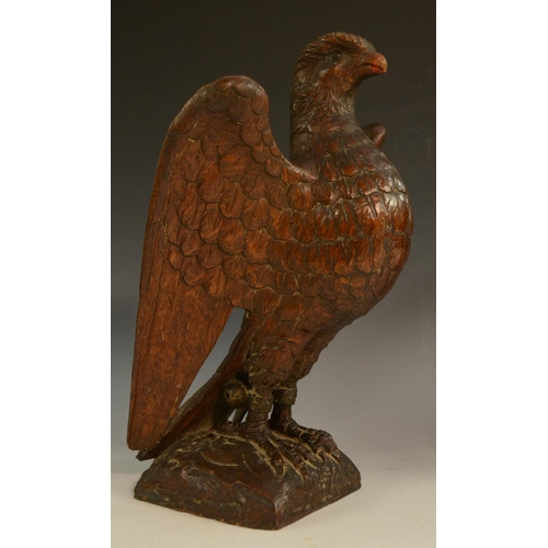 3127 - A pair of 19th century oak country house newel post crestings, each well carved as a falcon, the bea... 