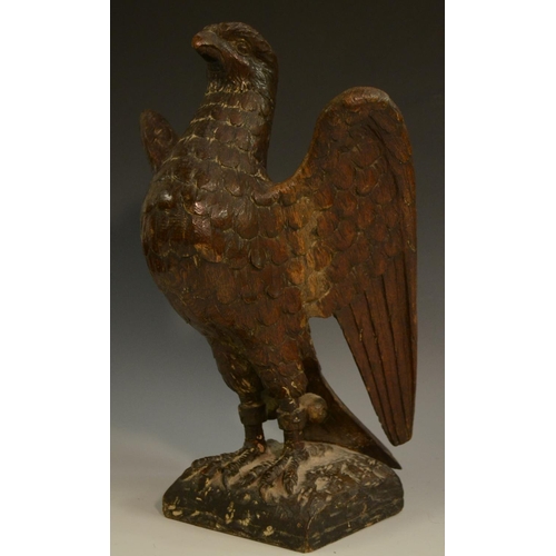 3127 - A pair of 19th century oak country house newel post crestings, each well carved as a falcon, the bea... 