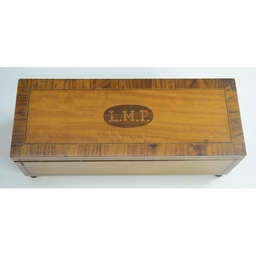 3144 - A Sheraton Revival crossbanded satinwood rectangular box and cover, outlined throughout with boxwood... 