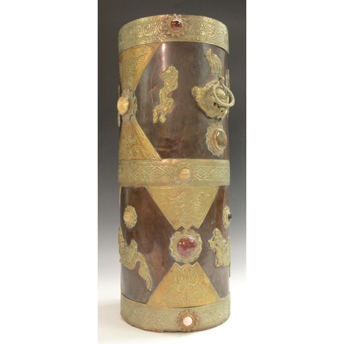 3148 - A Tibetan agate and brass mounted copper cylindrical walking stick stand, 45.5cm high, early 20th ce... 