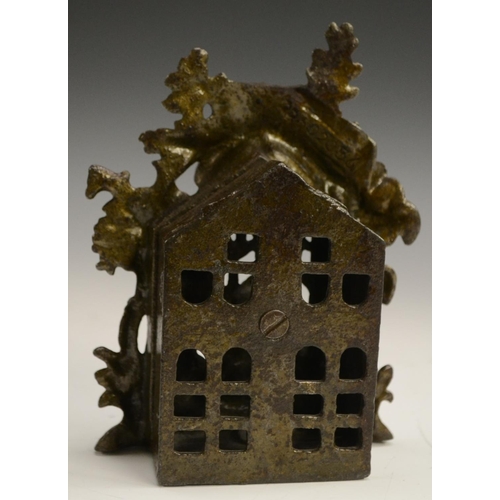 3152 - A Victorian cast iron novelty money box, as a bear raiding a bee skep, 14cm high, c. 1885