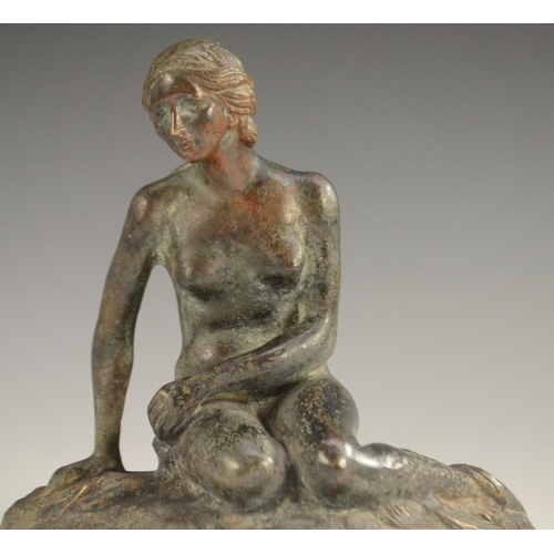 3165 - After Edvard Eriksen, a verdigris patinated bronze, The Little Mermaid, 22cm wide