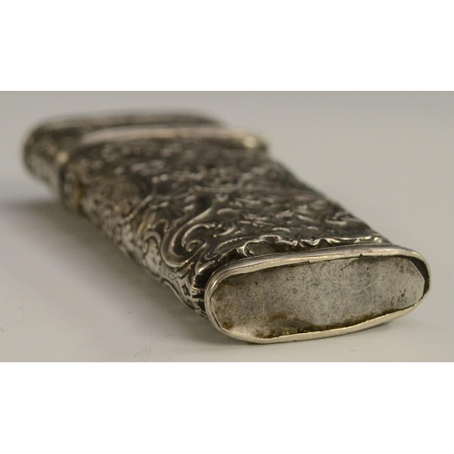 3168 - An 18th century silver-coloured metal tapered rectangular etui, chased overall in the Rococo taste w... 