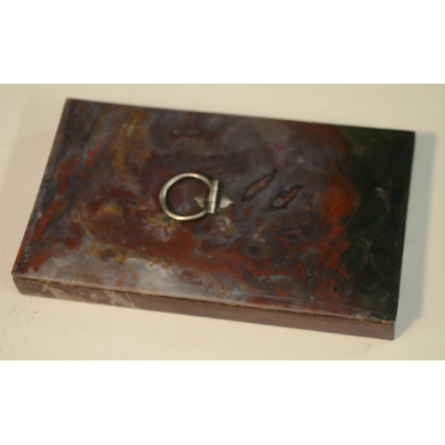 3169 - An agate and marble rectangular desk weight, silvered ring handle, 14.5cm wide