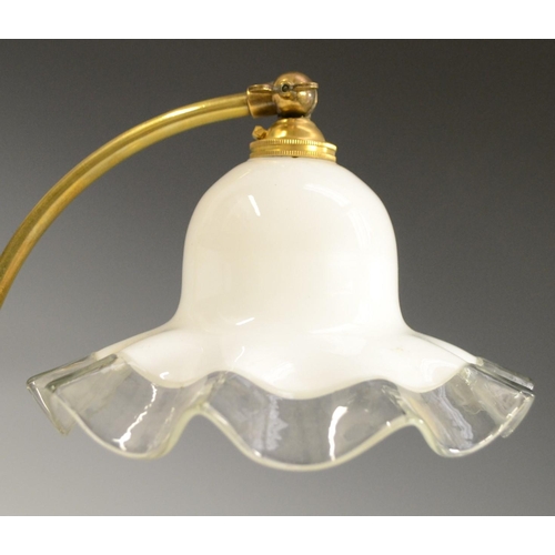 3174 - An Art Nouveau style brass adjustable C-frame desk or reading lamp, opaque glass shade with frilled ... 