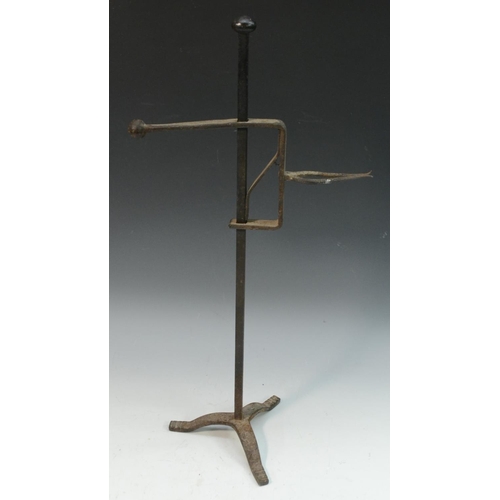 3303 - A 19th century wrought iron tripod adjustable lark spit, 48.5cm high