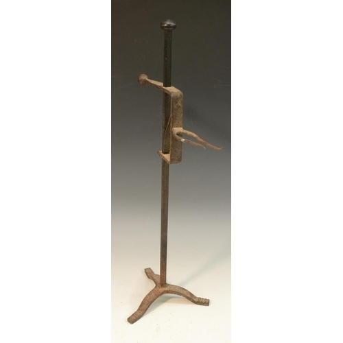 3303 - A 19th century wrought iron tripod adjustable lark spit, 48.5cm high