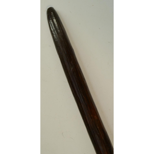 3805 - Tribal Art - an Australian Aboriginal nulla nulla or waddy club, carved with ridges and a textured g... 