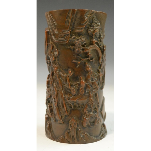 3068 - A Chinese hardwood bitong brush pot, carved in relief with figures and prunus trees in a monumental ... 