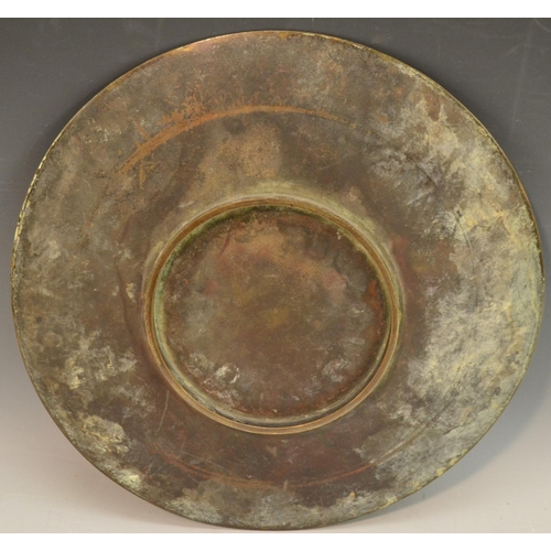 3100 - A Japanese bronze and mixed metal circular charger, chased and applied with boys busy on the river, ... 