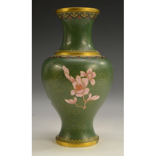 3102 - A Japanese cloisonné vase, enamelled with peonies and other foliage on a green ground, 23.5cm high, ... 