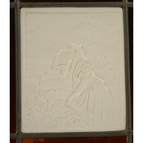 3110 - A KPM lithophane, no.404, 13cm x 11cm leaded amber stained glass border, 19.5cm x 17cm overall