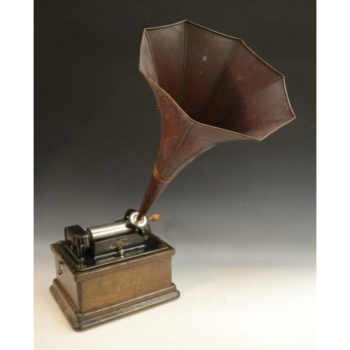 3147 - A Thomas A Edison fireside phonograph, combination type, serial no. 28940, oak domed top case, 30cm ... 