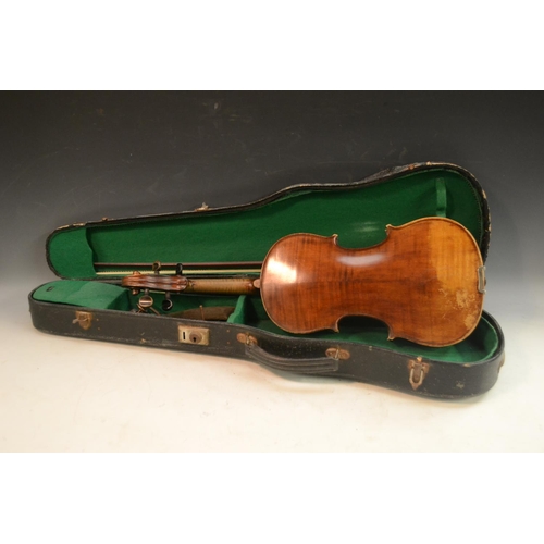 3159 - A violin, the two-piece back 36cm long excluding button, paper label inscribed Copy of Joseph Guarne... 