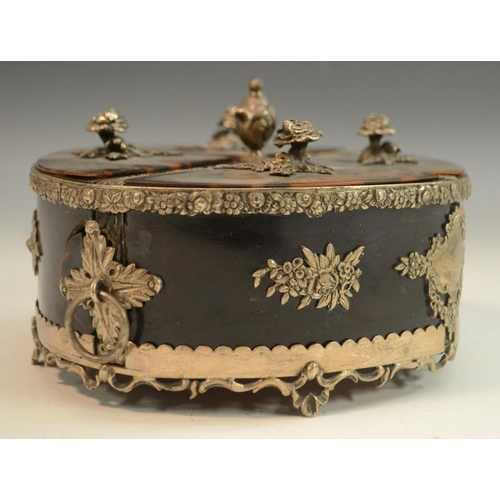 3157 - A Victorian silver coloured metal and tortoiseshell oval box, divided into quarters, flower handles,... 