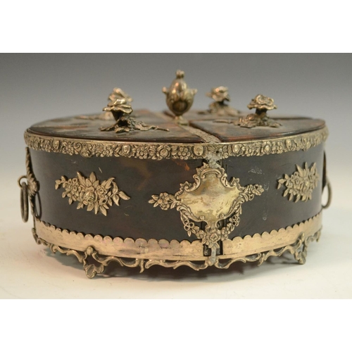 3157 - A Victorian silver coloured metal and tortoiseshell oval box, divided into quarters, flower handles,... 