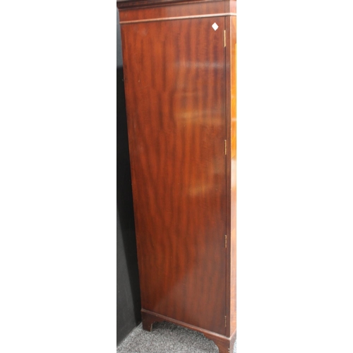 264 - A flame mahogany double wardrobe, by Maple & Co