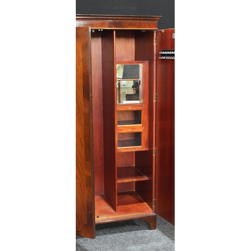 264 - A flame mahogany double wardrobe, by Maple & Co